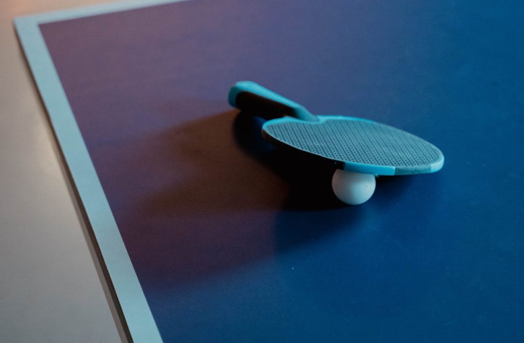 Table Tennis Paddle and a Ball